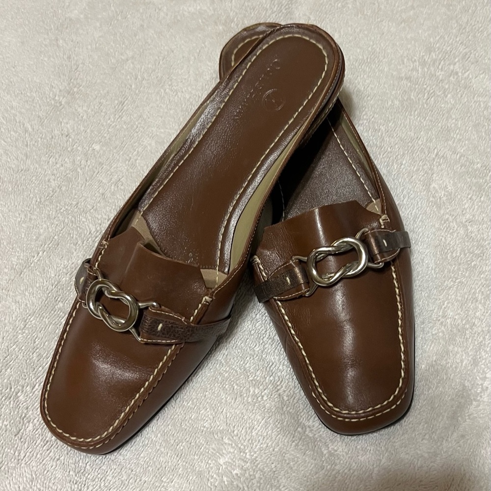 Cole Haan Brown slip-on leather loafers. These have Nike Air in the heel.